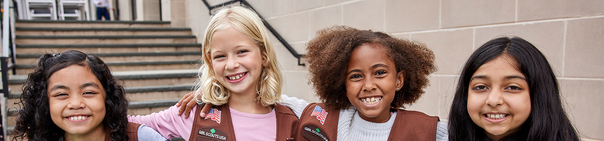  Brownie Girl Scouts smiling 