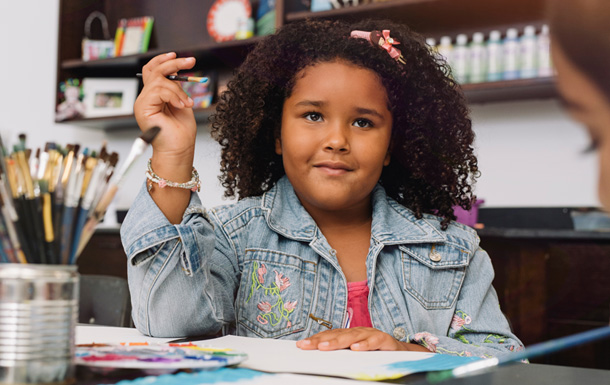 girl with paintbrush