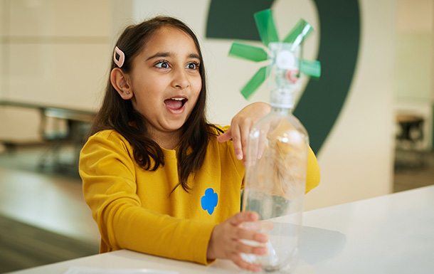 girl spinning a windmill