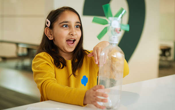 girl spinning a windmill