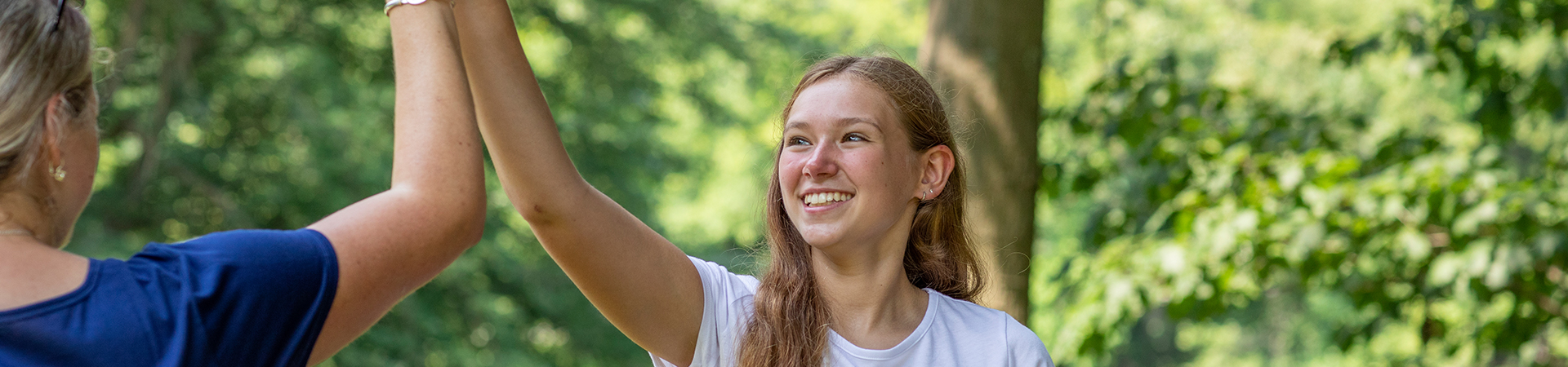  girl giving a high five 