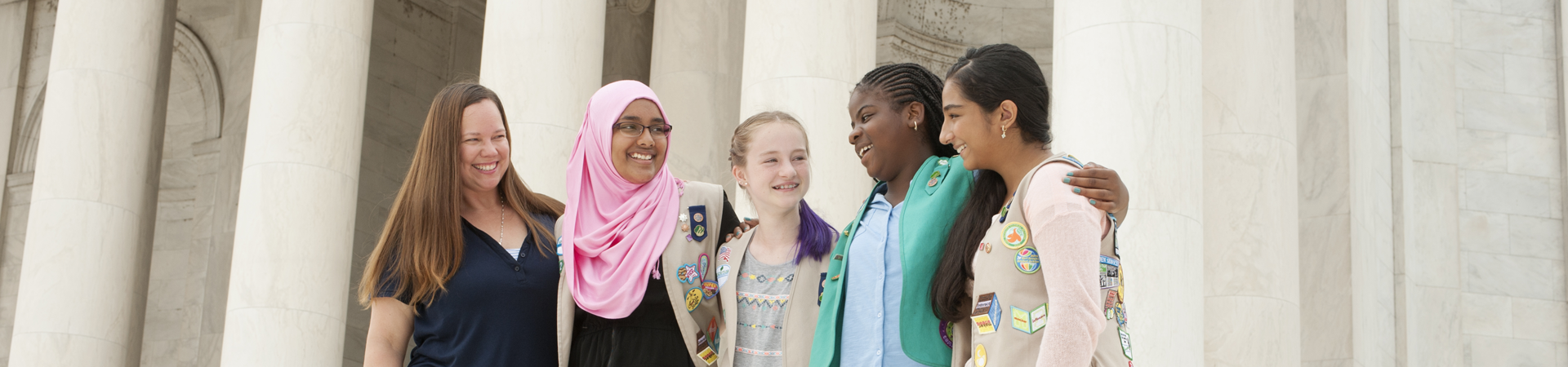  group of girl scouts smiling 